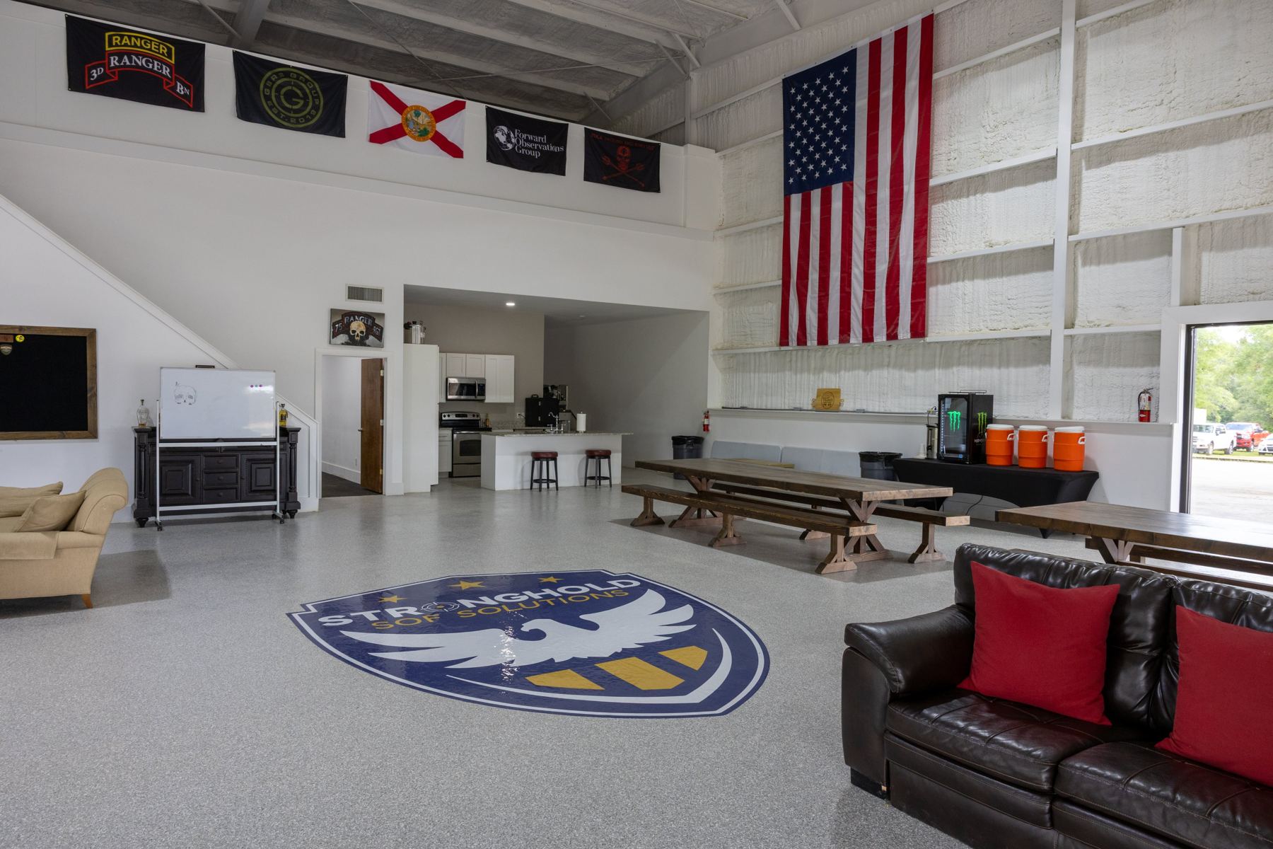 Clubhouse lounge, kitchen, and planning space